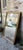 Louis Philippe style stucco and gilt wood mirror. Dimensions: 76.5 x 130 cm Depth: 2.5 cm Weight: 22 kg Hanging hardware...
