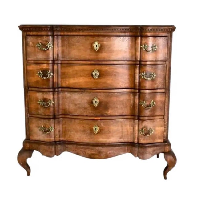 Handsome Dutch Baroque Chest on Stand. Chest is crafted in solid wood and features four generously proportioned drawers...