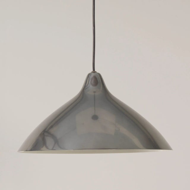 Beautifully organic aluminium pendant lamp designed by Lisa Johansson - Pape for Orno, Finland in 1951. This condition of...