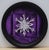 This artwork features a meticulously rendered paper snowflake, centered against a rich, purple backdrop that evokes a...