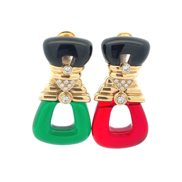 A bold and sculptural pair of late 20th century interchangeable drop earrings crafted in substantial 18 karat yellow gold,...