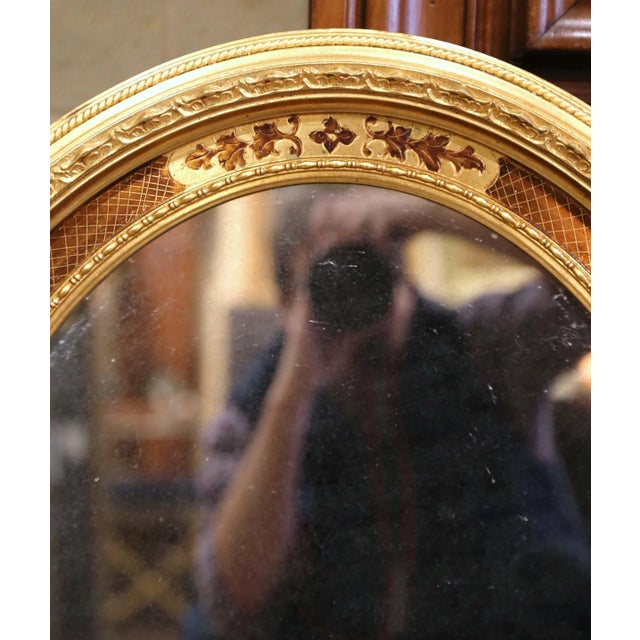 Wood Mid-20th Century French Oval Giltwood Mirror With Floral Motifs For Sale - Image 7 of 10