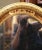 Wood Mid-20th Century French Oval Giltwood Mirror With Floral Motifs For Sale - Image 7 of 10