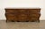 A beautiful French Provincial Louis XV style nine-drawer triple dresser or credenza By Baker Furniture USA, Circa 1980s...
