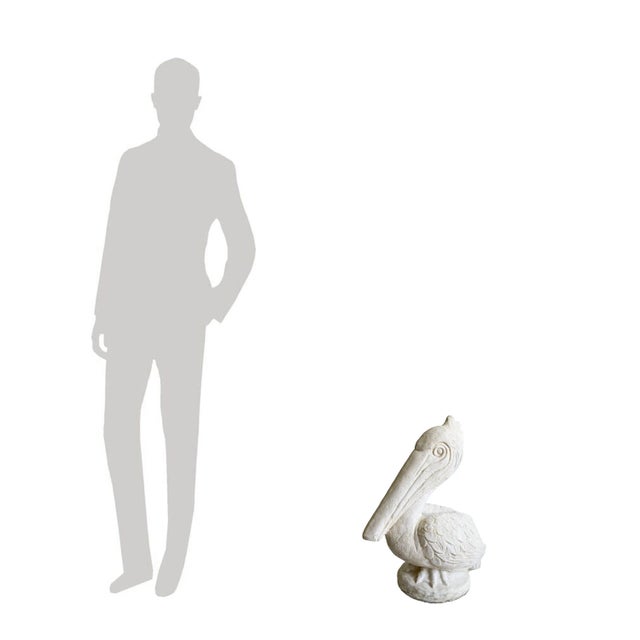 Add a splash of coastal charm to your space with this vintage 1960s concrete pelican statue. Perfect for indoor or outdoor...