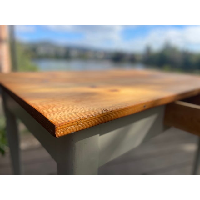 This charming antique table has been given a fresh coat of paint, sanded, and oiled. Width: 111 cm Depth: 70.5 cm Height:...