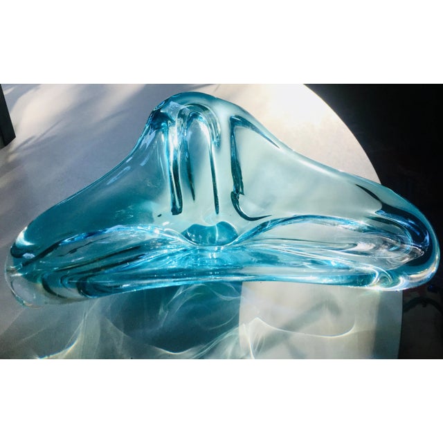 A decorative hand blown turquoise blue Murano glass centerpiece, organic design. Italy, 1960s, attributed to Antonio Da...