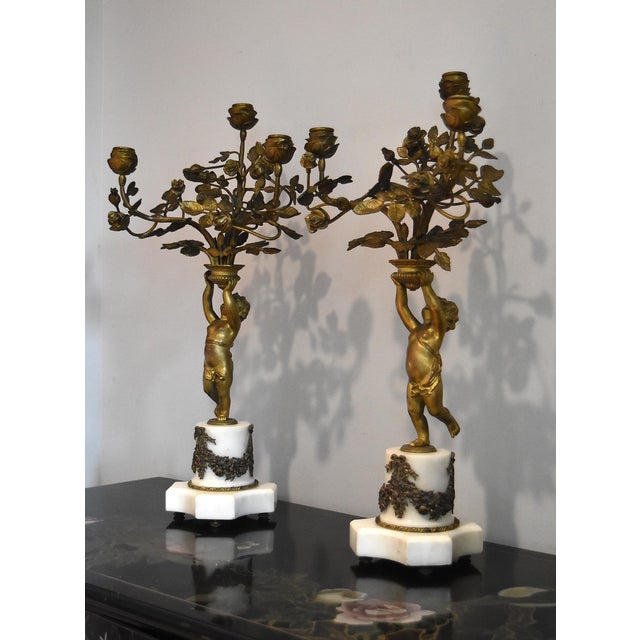 French French 19Th Century Louis XVI Style Gilt and Bronze Mounted Cherub Candelabras on White Marble Stands For Sale - Image 3 of 17