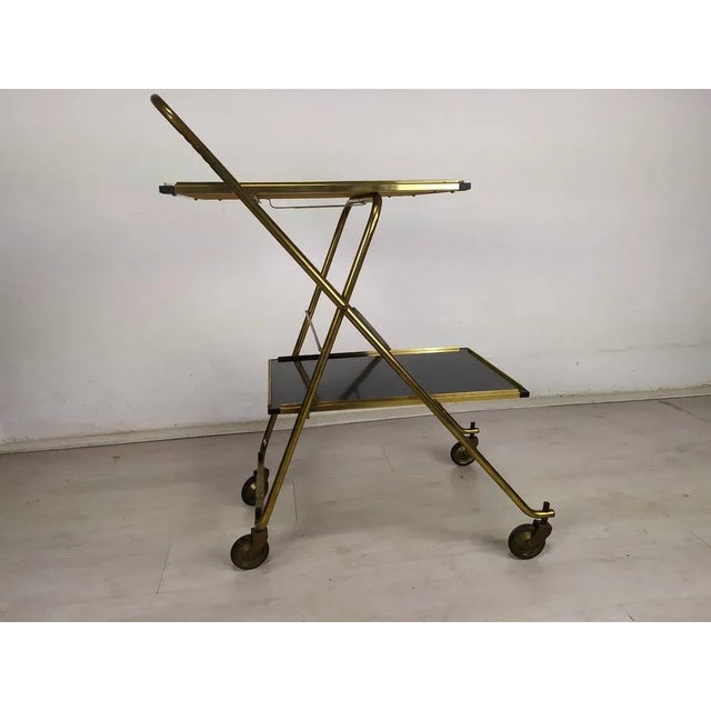 Folding Cart on Wheels in Brass, in Good conditions. Designed 1950 to 1959