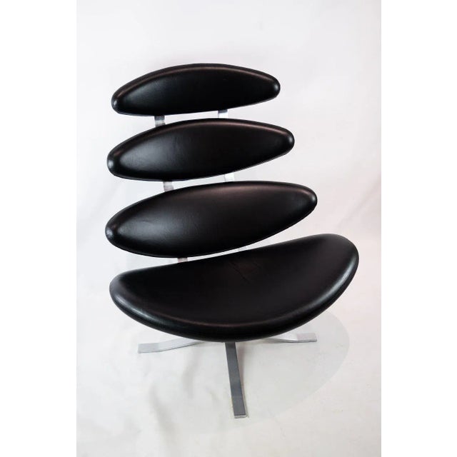 Corona easy chair, model EJ 5, designed by Poul M. Volther in 1964 and manufactured at Erik Jørgensen. The chair is...