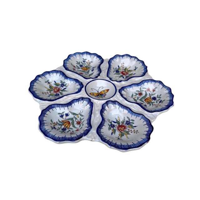 Unusual rare French, faience oyster plate signed Fourmaintraux Desvres, circa 1890. Butterfly on the center surrounded by...