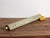 This antique japanese kakejiku is a hanging scroll of a crane in colour on paper, with a textile mount and wooden rods. It...