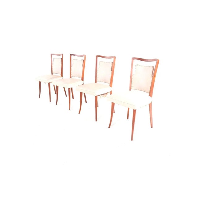 Six Italian dining chairs in nappa with nails. Made in Italy in the 1930's. Perfect to combine with a deco dining table or...