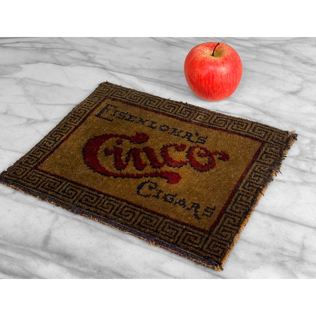 A Cigar Store Eisenlor's Cinco Countertop Change Rug Mat, c. Early 20th Century - Advertising Countertop Mat by Eisenlor...