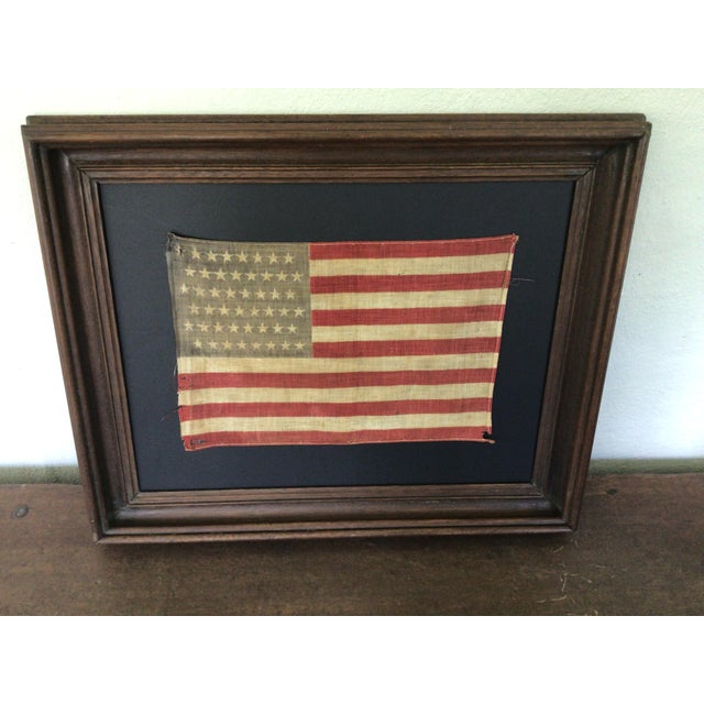Antique Staggered 48 Star American Flag 1912. Made from cotton gauze and set in an age related frame and under glass. This...