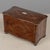 A 19th century French Napoleon III marquetry double compartment tea caddy, featuring a serpentine silhouette and parquetry...
