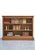 K0669 a highly desirable late victorian solid oak open bookcase of unusually low proportions, expertly crafted in england...