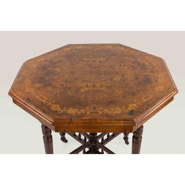 Octagonal wooden coffee table realized in Italy in the early 20th Century. Very good condition.