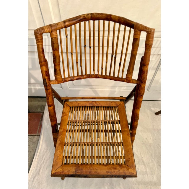 Fantastic vintage set of six folding bamboo chairs featuring a rich tortoiseshell style finish with beautiful natural...