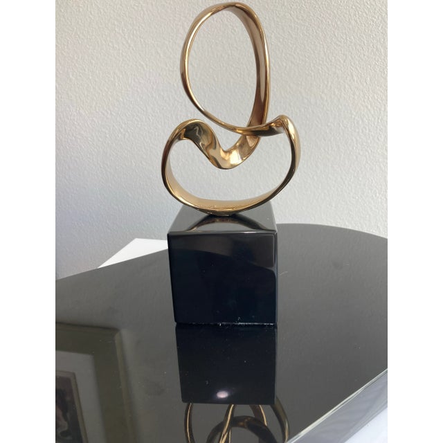 Purchased from Bennett Studios in Northern CA. The curving lines are flowing and graceful conveying a sense of progression...