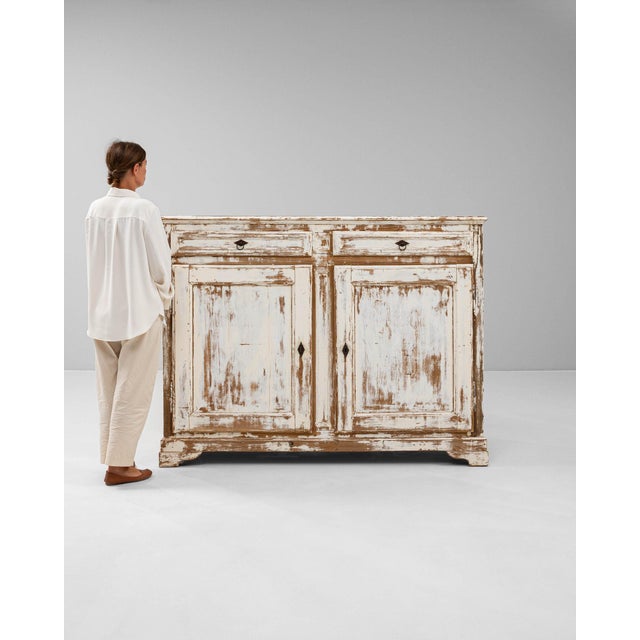 This chest carries genuine presence, its whitewashed distressed finish, paneled front immediately setting the tone for the...