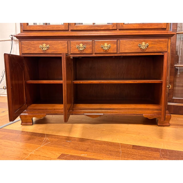 Design Plus Gallery presents a China Hutch from Drexel Heritage. This classic display cabinet offers a balanced...