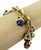 The Legnazzi Multi-Color Gems 18k Yellow Gold 5 Fancy Egg Charms Chain Bracelet is a stunning piece of vintage and antique...