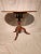 Beautiful round cherry table from the 18th century. It has a birdcage support for the tilt top and tripod base. It has...