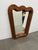 Design Plus Gallery presents the Riviera Ripple Mirror from Jonathan Adler. The mirror has a traditional shield shape with...