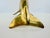 A vintage brass dolphin sculpture with a beautifully streamlined form and warm, naturally aged patina. The sculptural body...