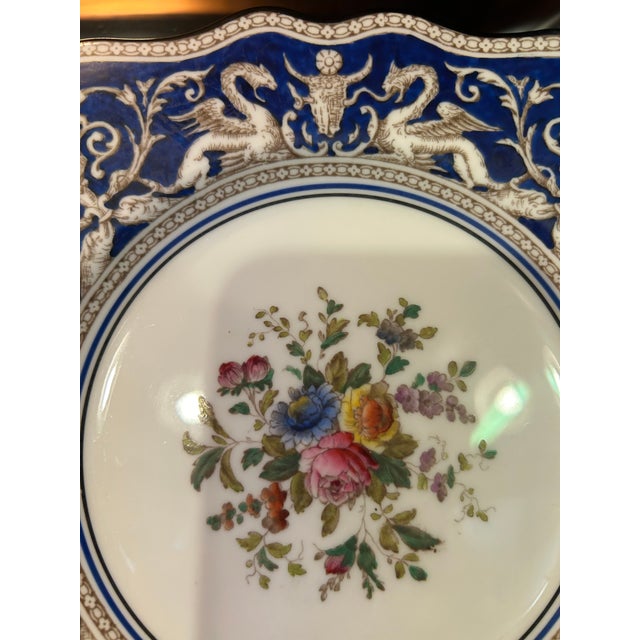 Gorgeous rare set of 12 Wedgewood vintage luncheon plates having marvelous details, blue and white decoration around the...