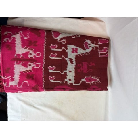 This handwoven vintage cotton throw is indonesian. It features many exciting patterns or characters. One appears to be a...