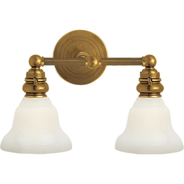 Boston Functional Double Light in Hand-Rubbed Antique Brass with White Glass Designer: Chapman & Myers Height: 9"...