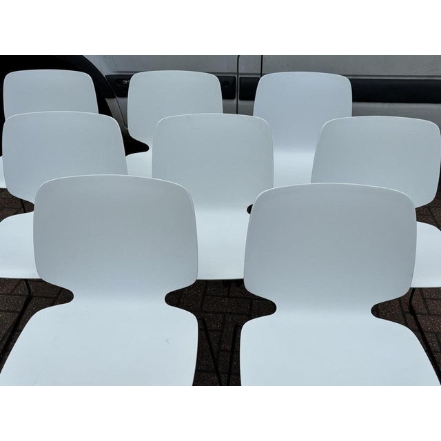 8 pedrali - babila stacking indoor / outdoor dining chairs. Dimensions: h: 79 cms sh: 46.5 cms w: 47 cms d: 50 cms a used...