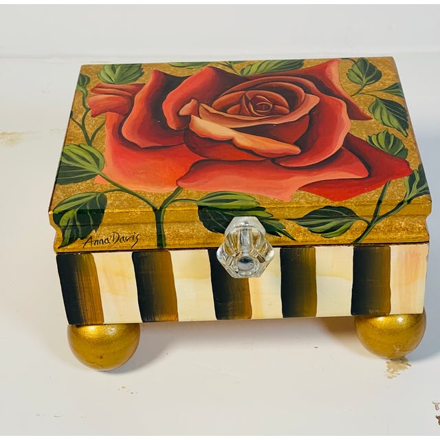 Handpainted treasure box signed Anna Davis with red rose , gold inside and lucite handle.