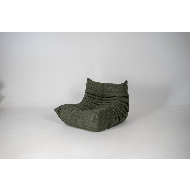 This Togo has been reupholstered with new foam and high-quality new fabric, keeping its inner structure, giving the item...