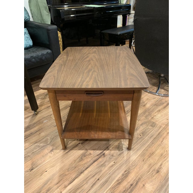 Dual tier semi oval accent table with drawer, rounded corners in excellent vintage condition with minimal age appropriate...