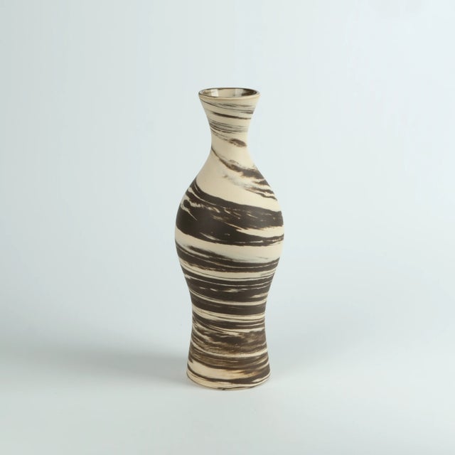 Curvaceous marbled vase, wheel-thrown from marbled dark and white stoneware and coated with "Crystal Clear" glaze....