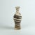 Curvaceous marbled vase, wheel-thrown from marbled dark and white stoneware and coated with "Crystal Clear" glaze....