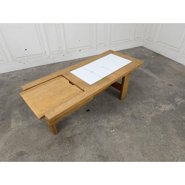This vintage coffee table from the 1960s is a real gem! Designed in the 1960s by the design duo Robert Guillerme and...
