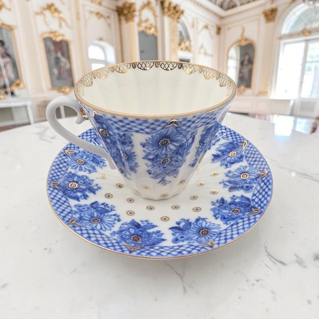 A vintage Lomonosov Porcelain teacup and saucer in the Bridesmaid / Bridesmaid Basket pattern, produced in St. Petersburg...
