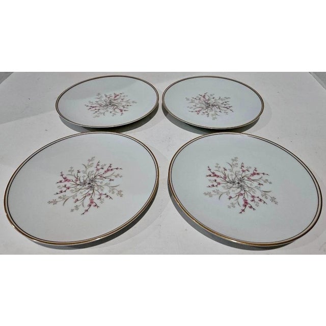 Vintage Noritake Claire dessert/bread plate set of 4, featuring a delicate pink floral design and elegant gold-tone trim....