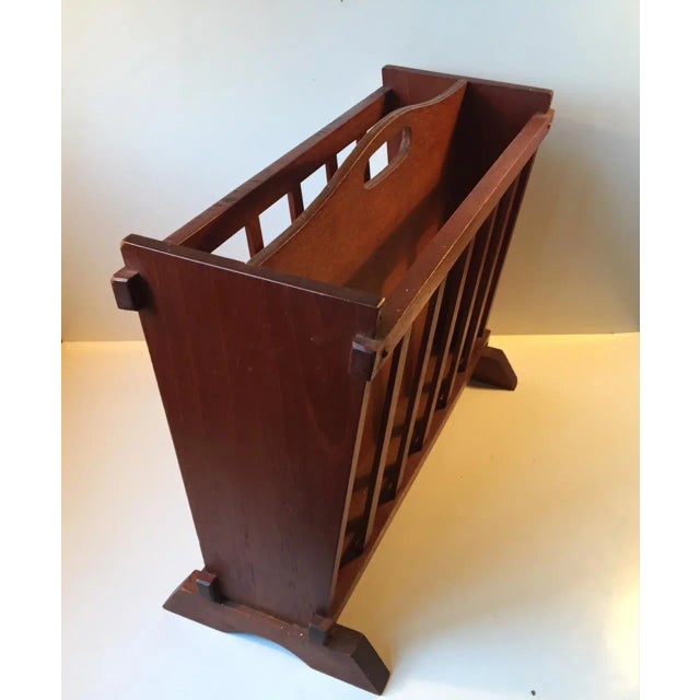 This Danish magazine rack from the 1960s is made from teak.