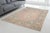 Elevate your living space with this exquisite, hand-knotted vintage Turkish rug. Featuring a sophisticated and calming...