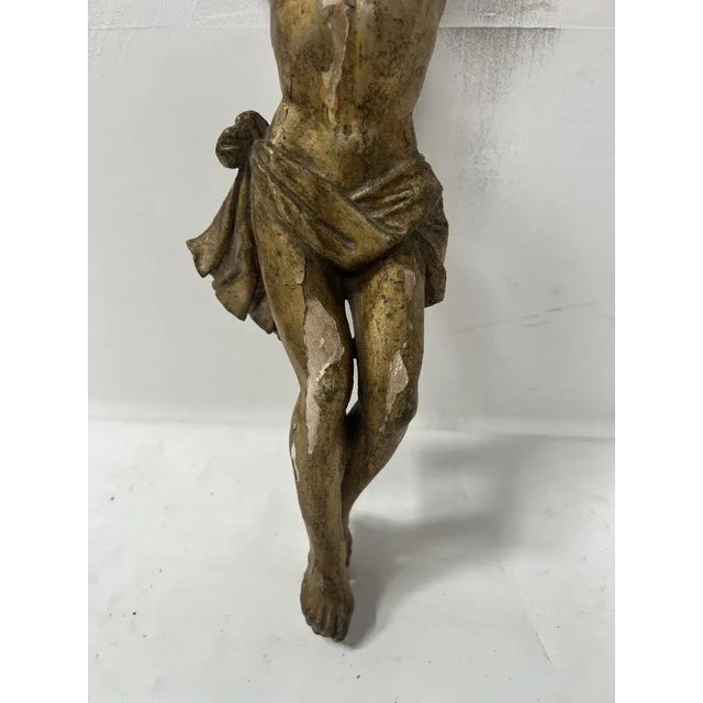 Christ in carved and gilded wood Wear and small missing parts see photos Dimensions H 47 x W 26 x 9 cm Christ dimensions...