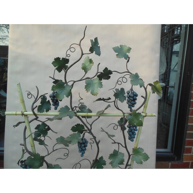 An Italian tole grape tree. The vintage tole tree in full bloom on both sides with multiple bunches of life like blue...