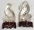 Beautiful pair of antique carved rock crystal birds on ornately carved bases. One of the birds is missing part of a cherry...