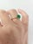 This is a Zambian emerald round brilliant cut in an 18k gold solitaire ring Details: 1.67 carat round 7.5mm Deep forest...