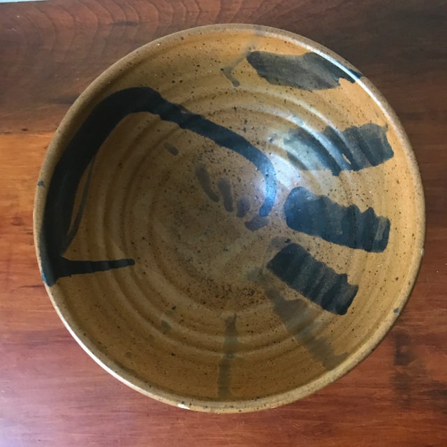 Where to start…we love the glaze texture, colors and movement in this beautiful bowl. Signed on the bottom.