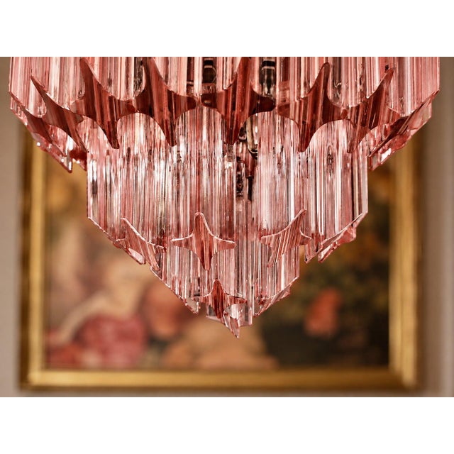 Fantastic and big Murano chandelier made by 112 Murano pink prism "quadriedri" in a nickel metal frame. Period: late 20th...
